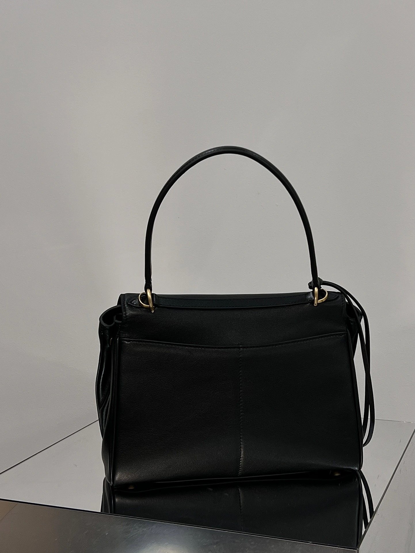 Balenciaga 24S Black Gold Slouchy Handbag -  Elegance Redefined OnTrend 72561