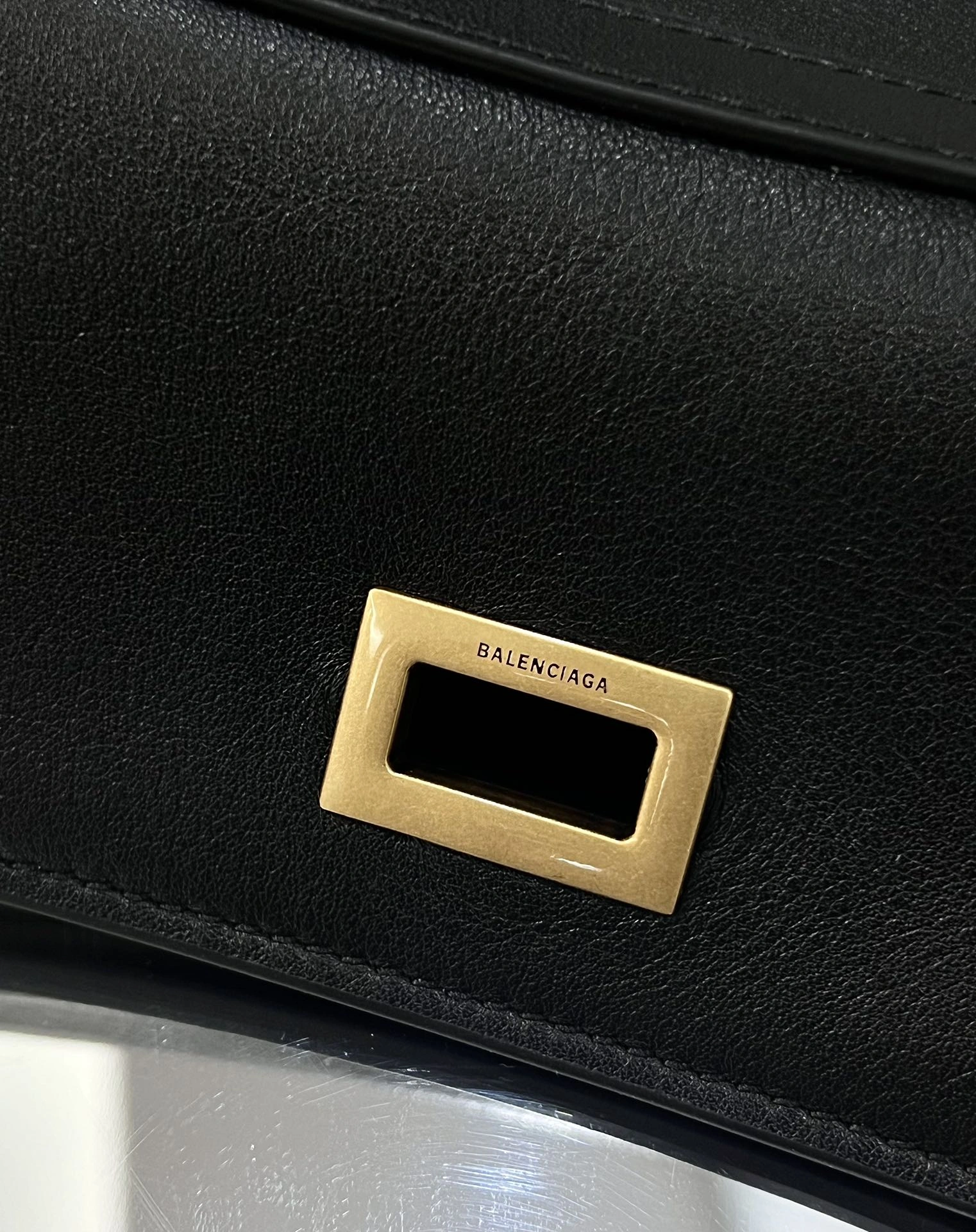 Balenciaga 24S Black Gold Slouchy Handbag -  Elegance Redefined OnTrend 72561