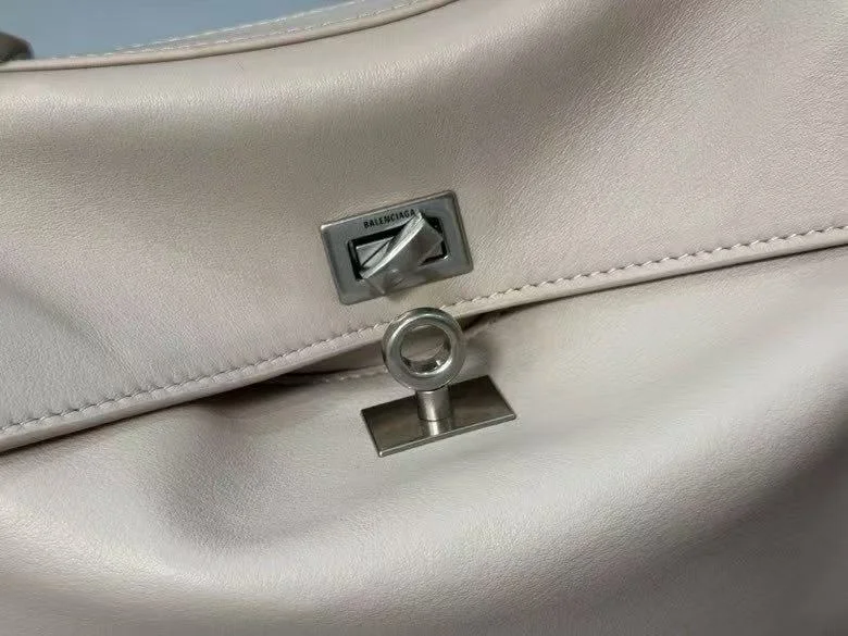 Balenciaga Chic Apricot Handbag with Silver Buckle -  Elegance SportInspired 38250