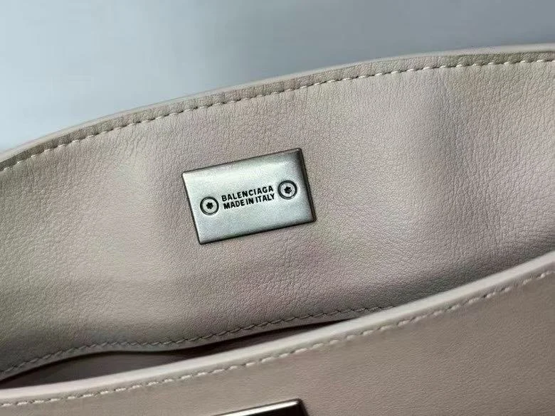 Balenciaga Chic Apricot Handbag with Silver Buckle -  Elegance SportInspired 38250