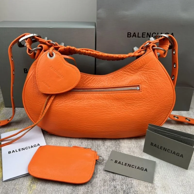 Stylish Balenciaga Le Cagole Half-Moon Dumpling Bag in Orange Wax 38349