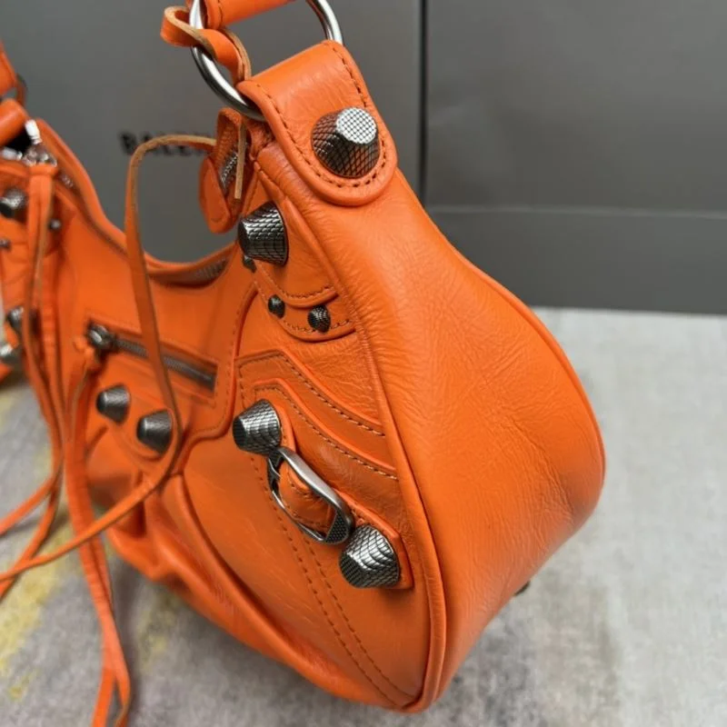 Stylish Balenciaga Le Cagole Half-Moon Dumpling Bag in Orange Wax 38349