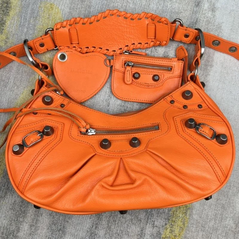 Stylish Balenciaga Le Cagole Half-Moon Dumpling Bag in Orange Wax 38349