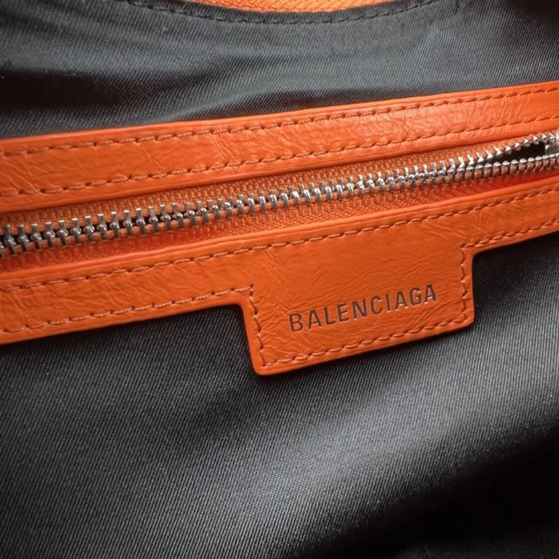 Stylish Balenciaga Le Cagole Half-Moon Dumpling Bag in Orange Wax 38349