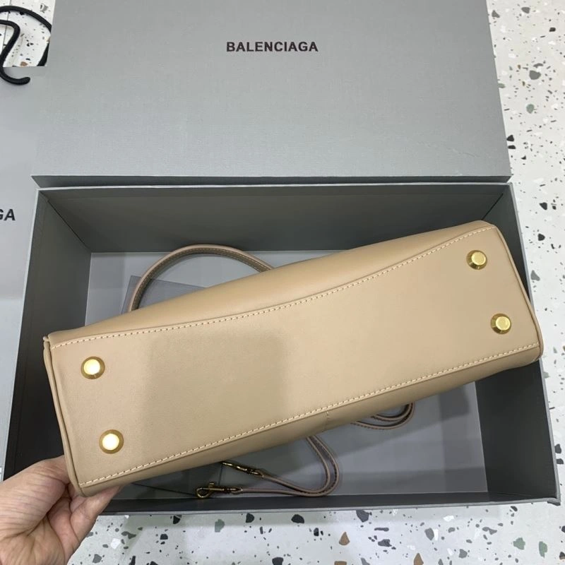 Balenciaga Rebel Chic Medium Apricot Handbag -  Leather Elegance WellDesigned 66989