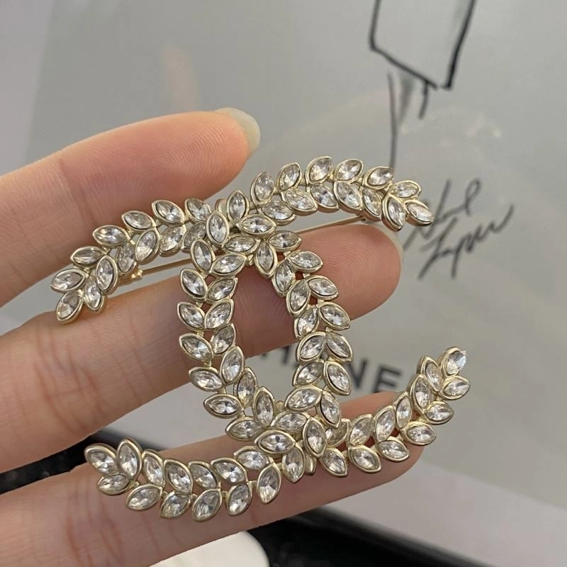Neat Chanel Brooches 230824