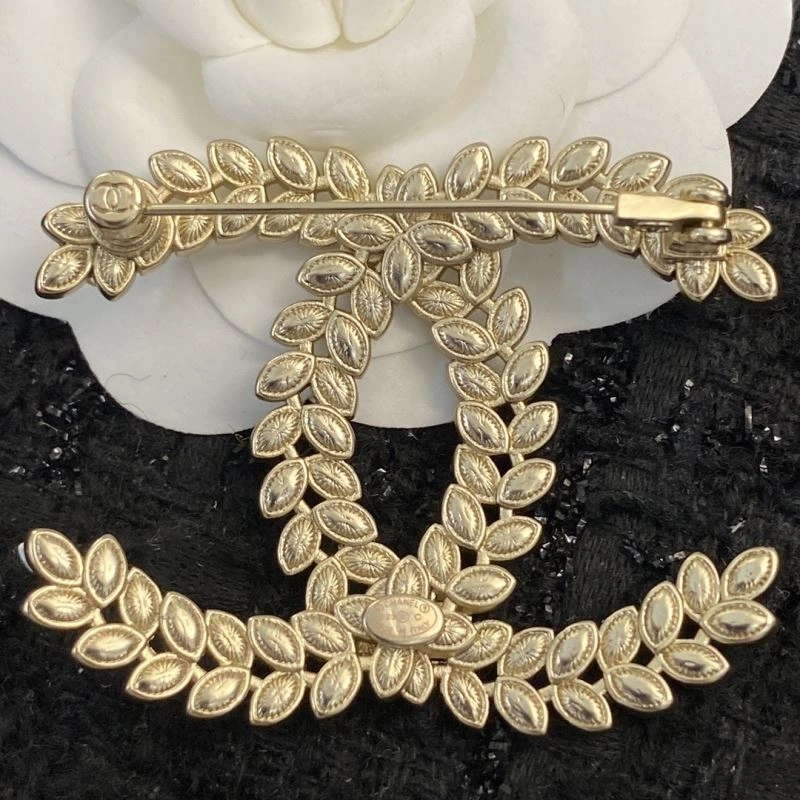 Neat Chanel Brooches 230824
