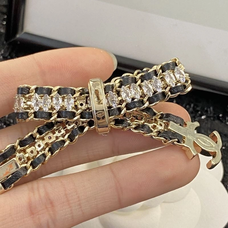 Sleek Chanel Brooches 230808