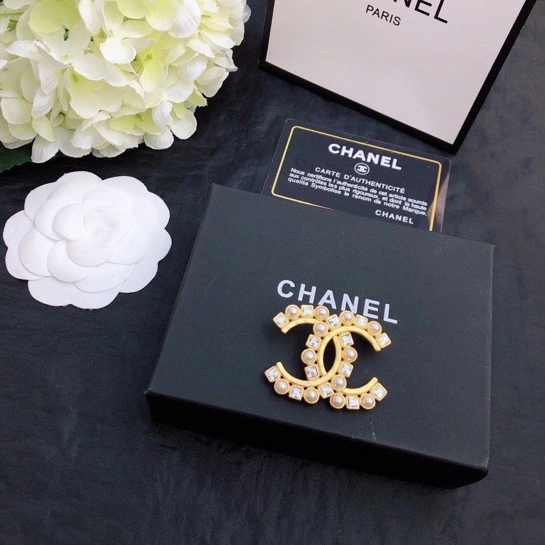 Timeless Chanel Brooches 230828
