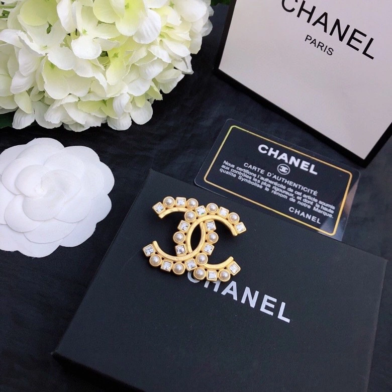 Timeless Chanel Brooches 230828