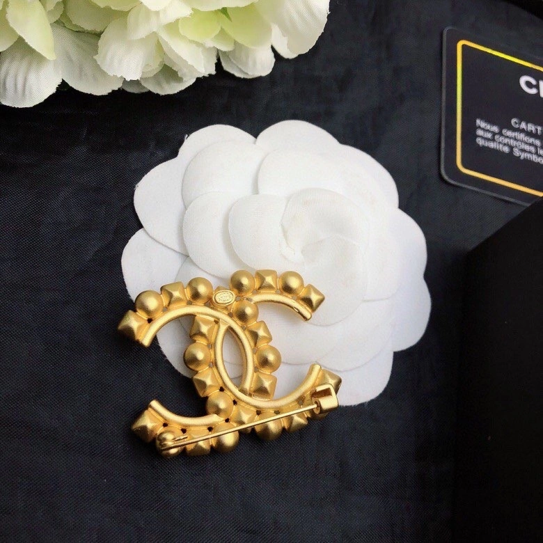 Timeless Chanel Brooches 230828