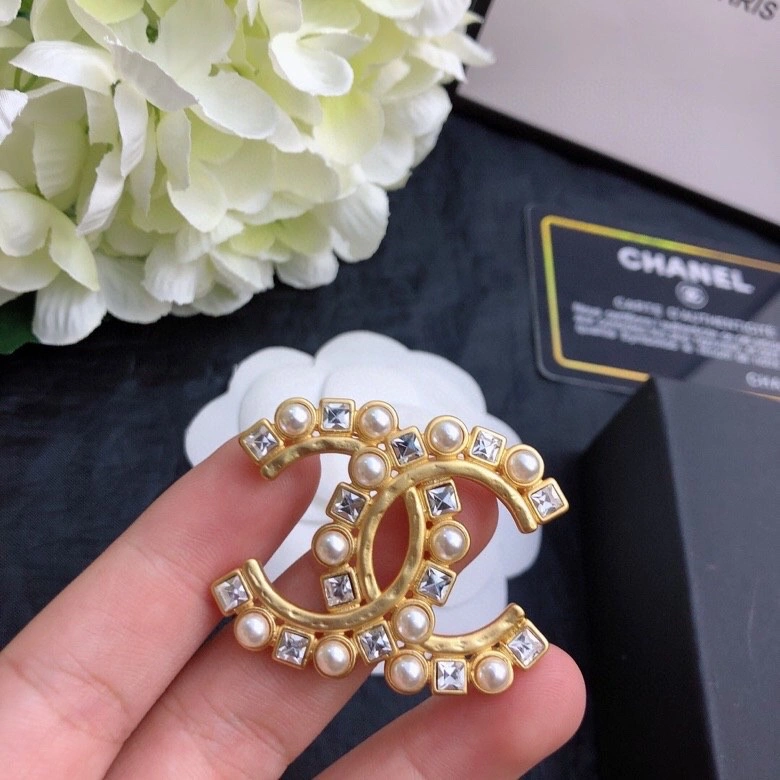 Timeless Chanel Brooches 230828