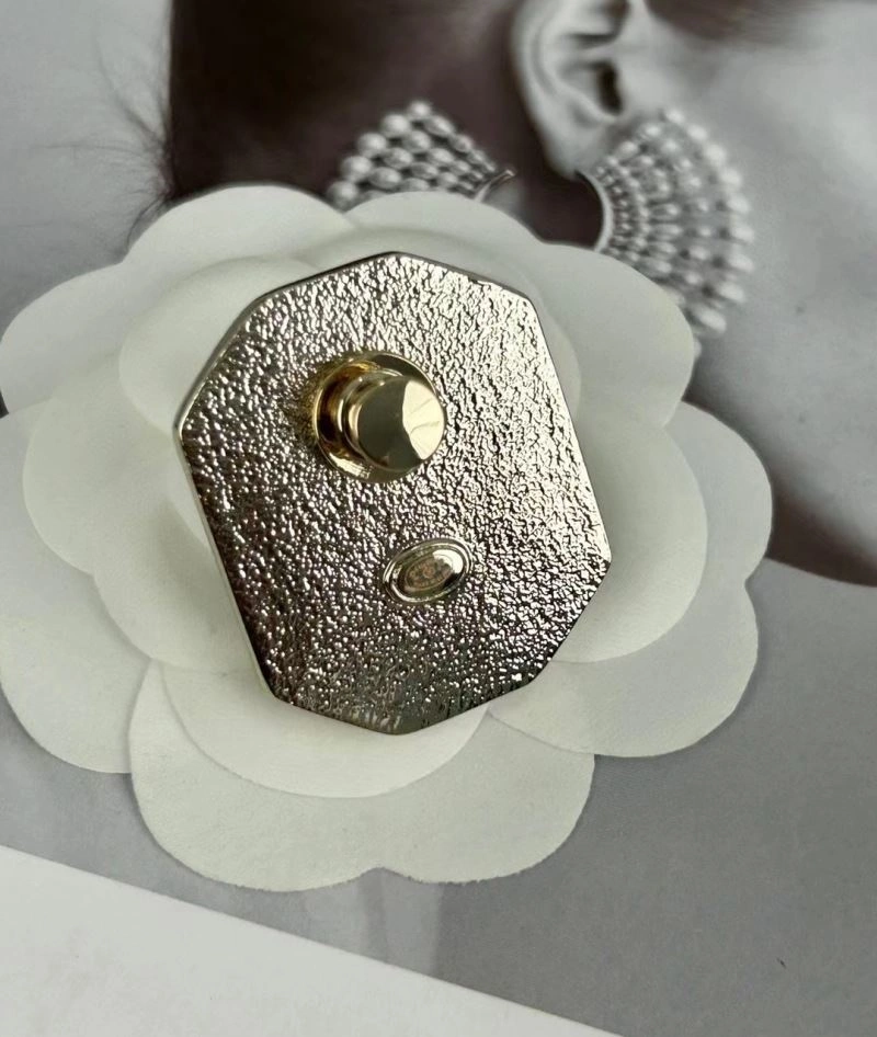 Sporty Chanel Brooches 230810