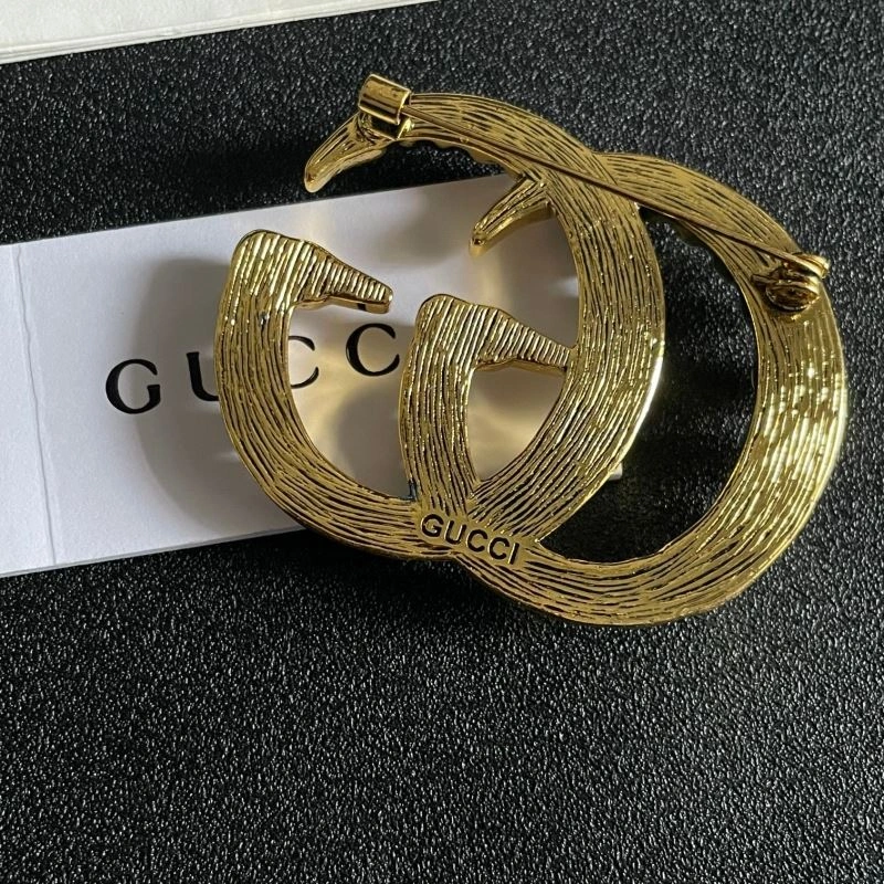 Trendsetting Gucci Brooches 244814