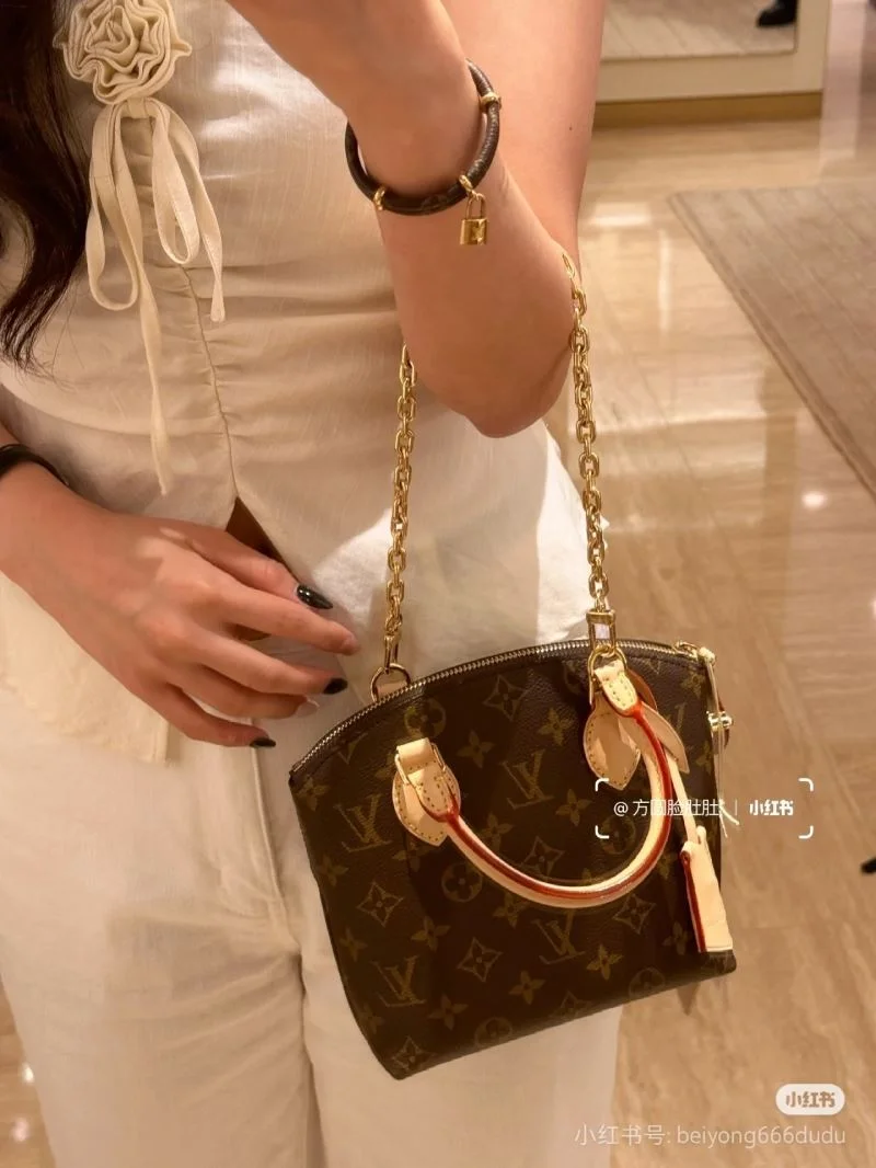 Compact Louis Vuitton Top Handle Bags 39375