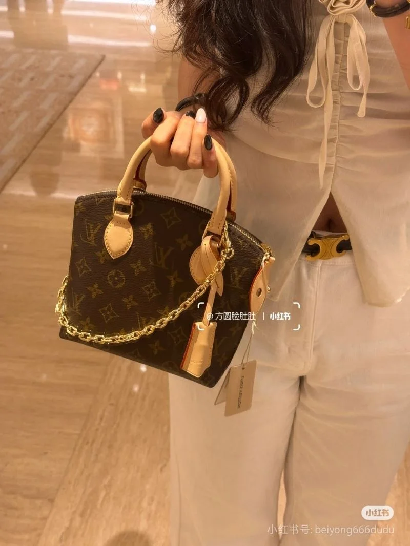 Compact Louis Vuitton Top Handle Bags 39375