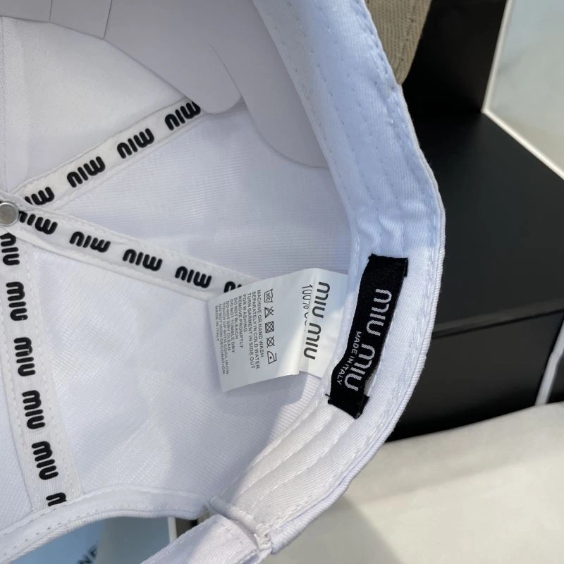 Miu Miu Caps FashionForward 257526
