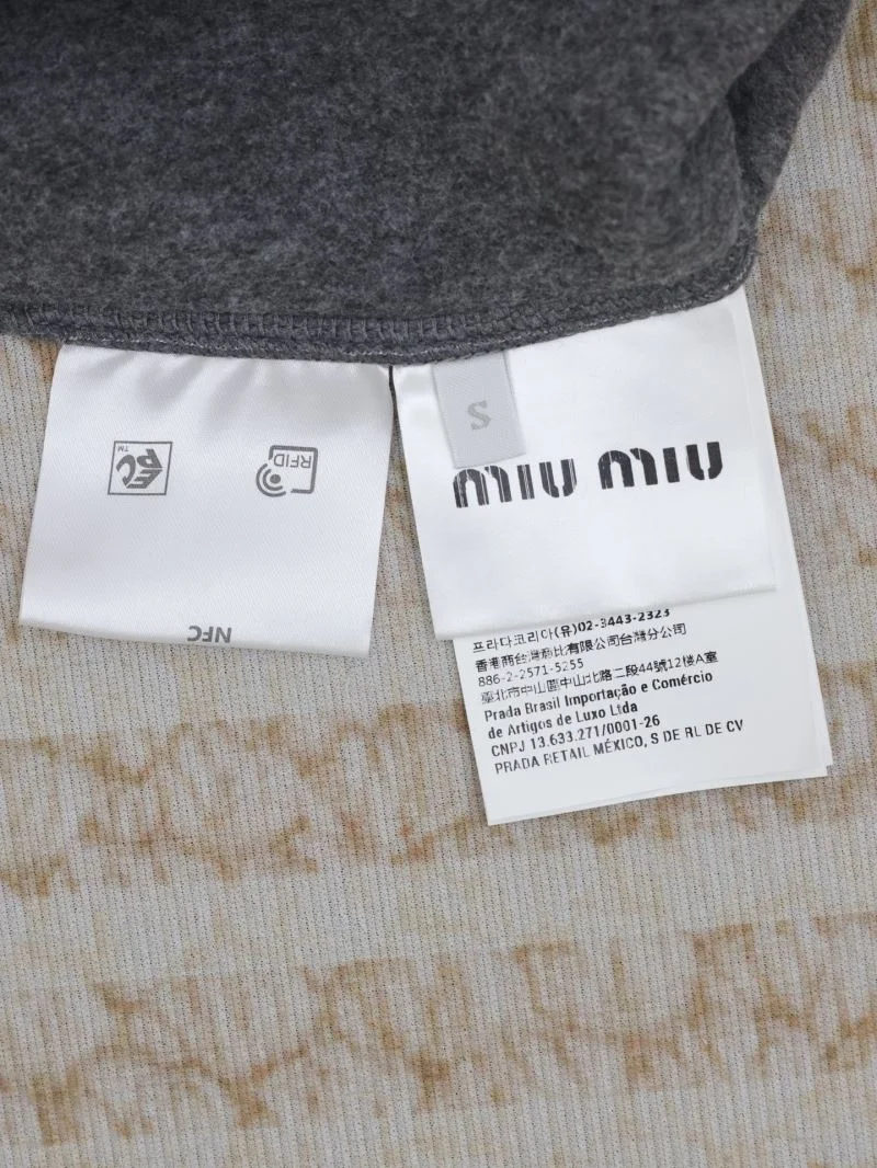 Modern Miu Miu Outwear 163566